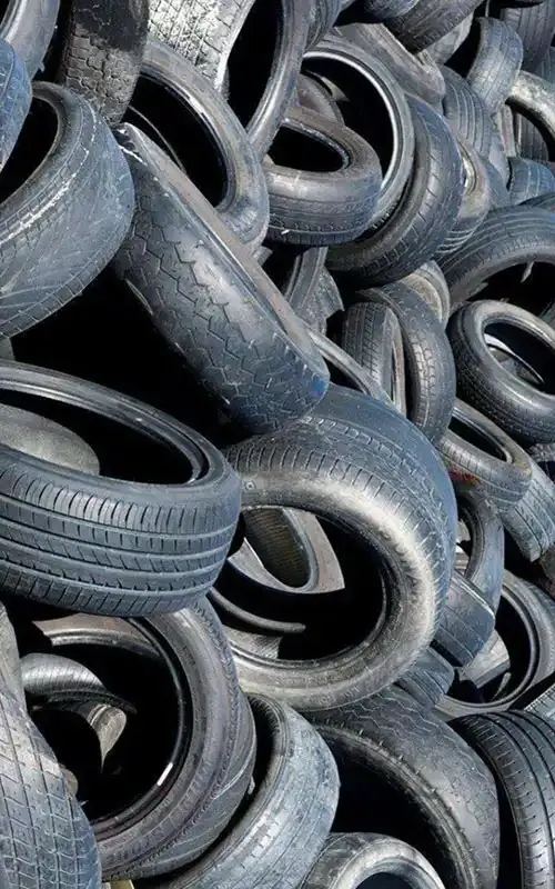 Loose whole waste tyres awaiting baling